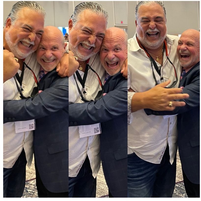 Gary embracing audience members after a keynote